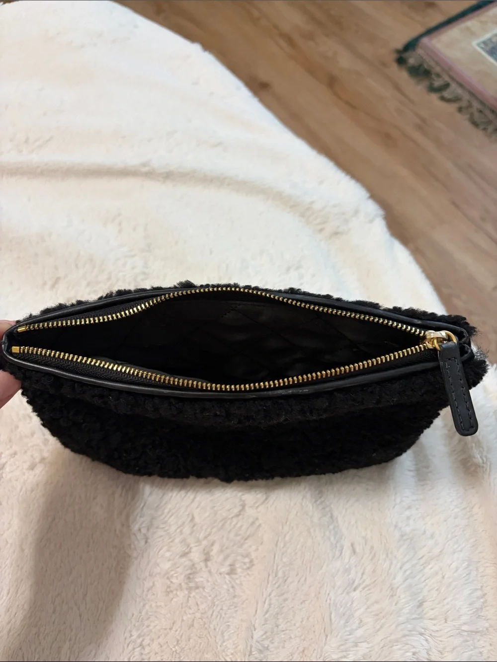 CHANEL Black Shearling Phone Case with Gold CC Emblem